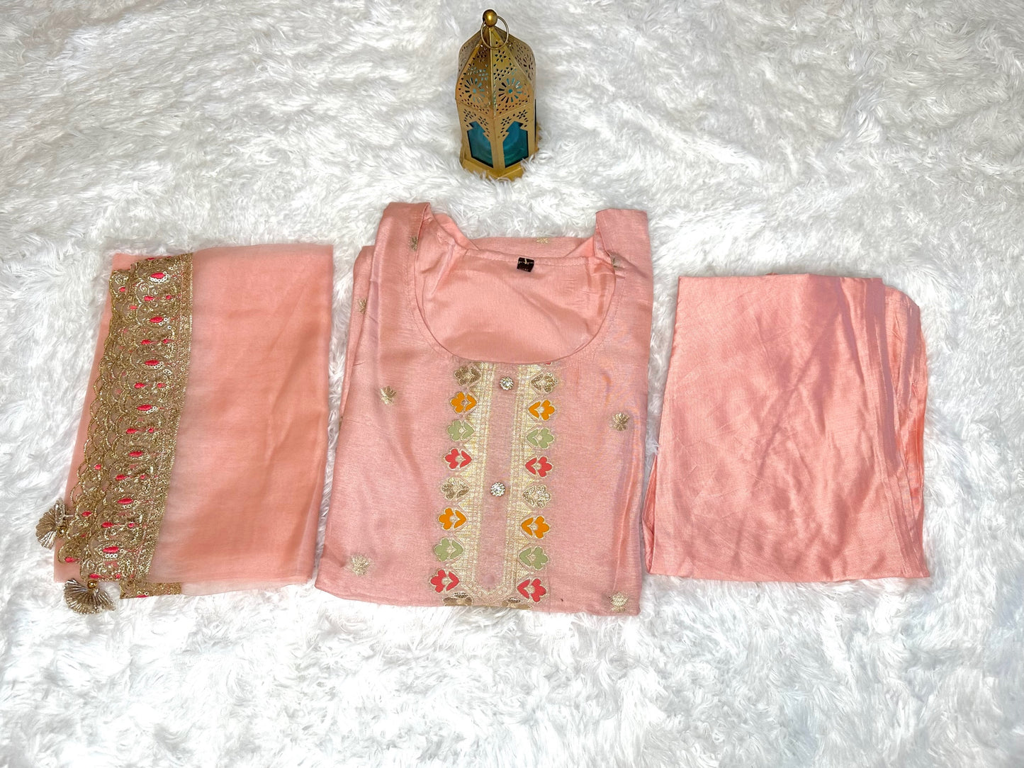 Pastel pink suit with bottom and lace work dupatta.