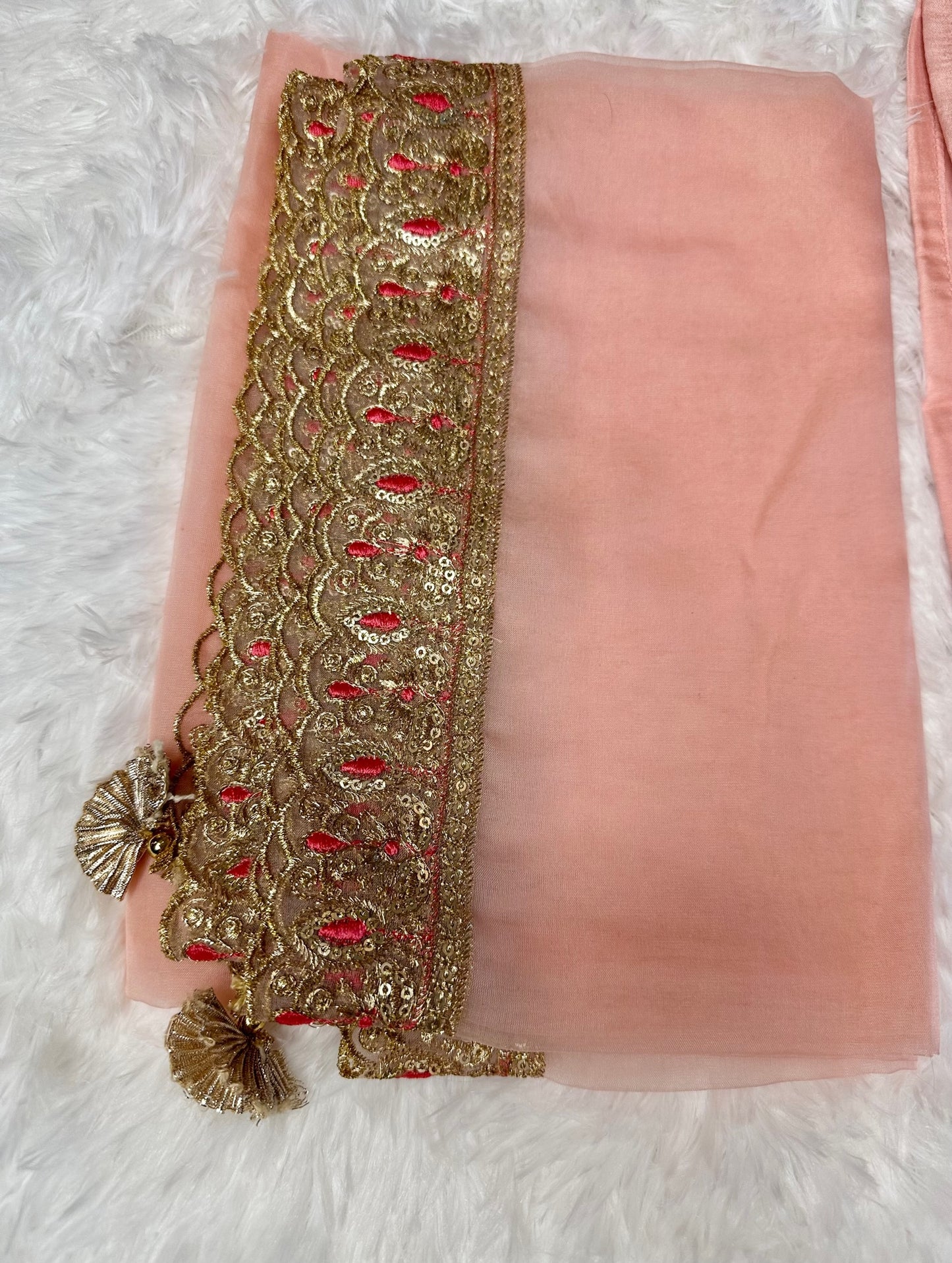 Pastel pink suit with bottom and lace work dupatta.