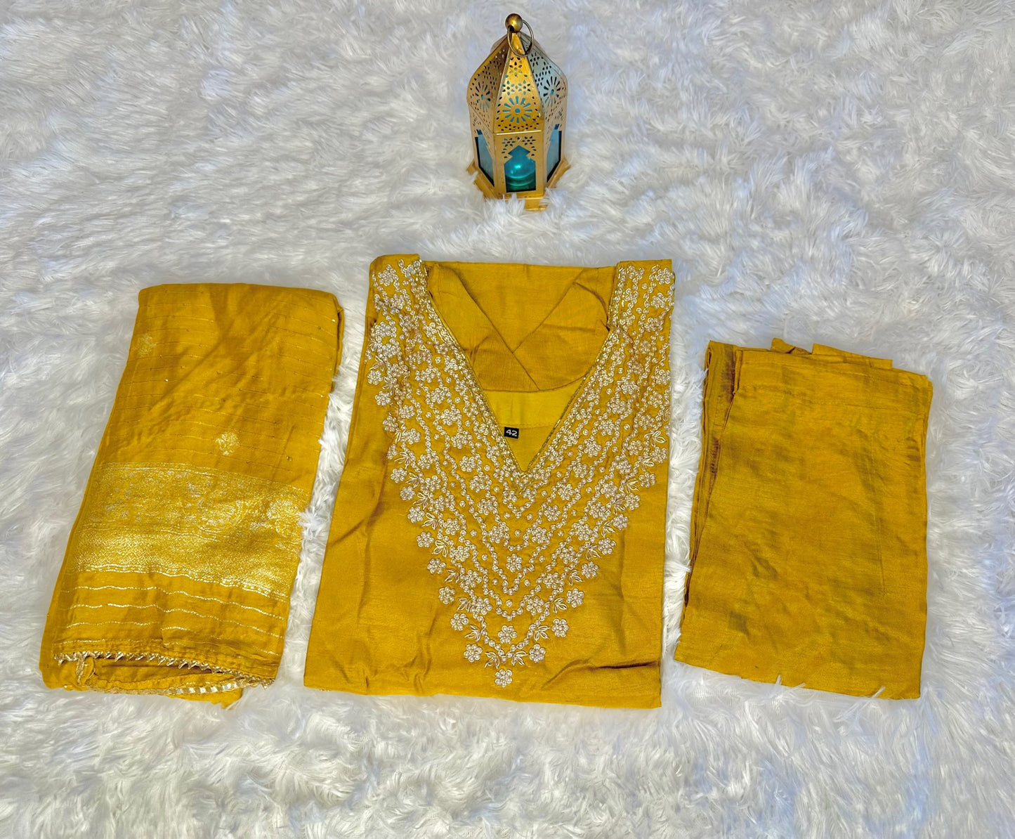 Pure dola silk suit with bottom and banaras style dupatta.