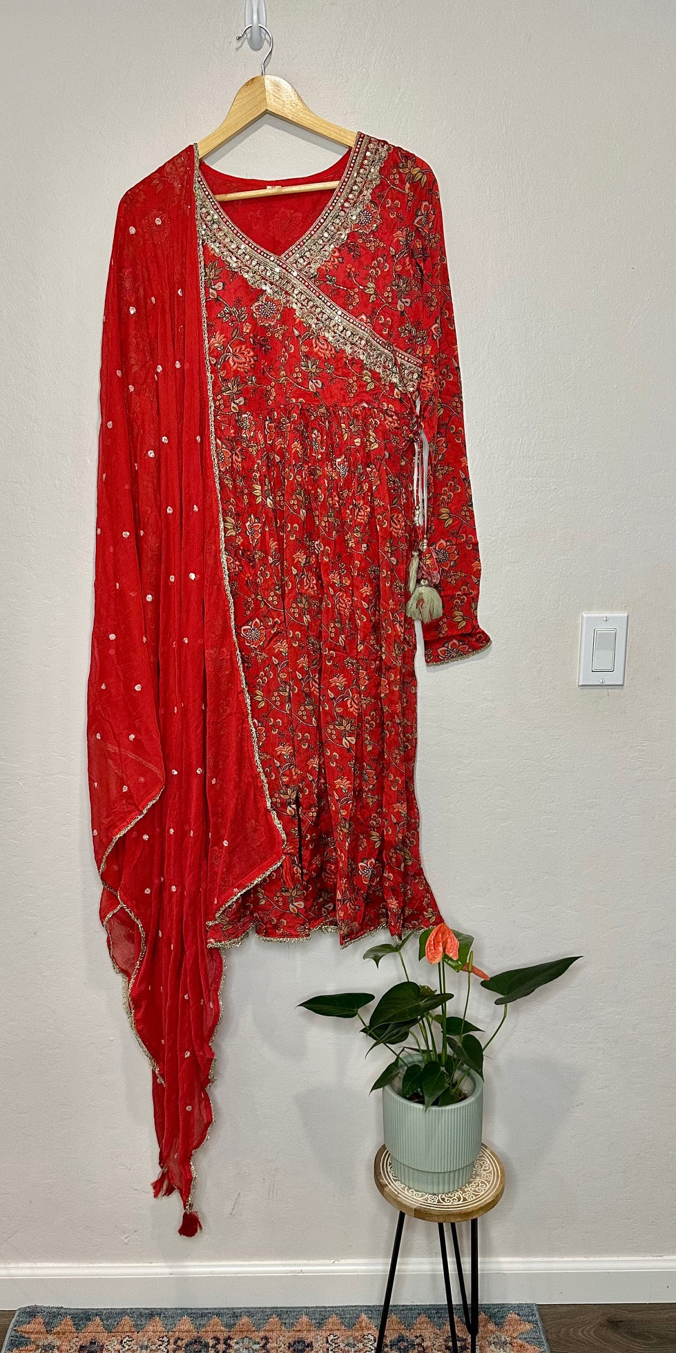 Beautiful red floral print anarkali suit with pant and dupatta.