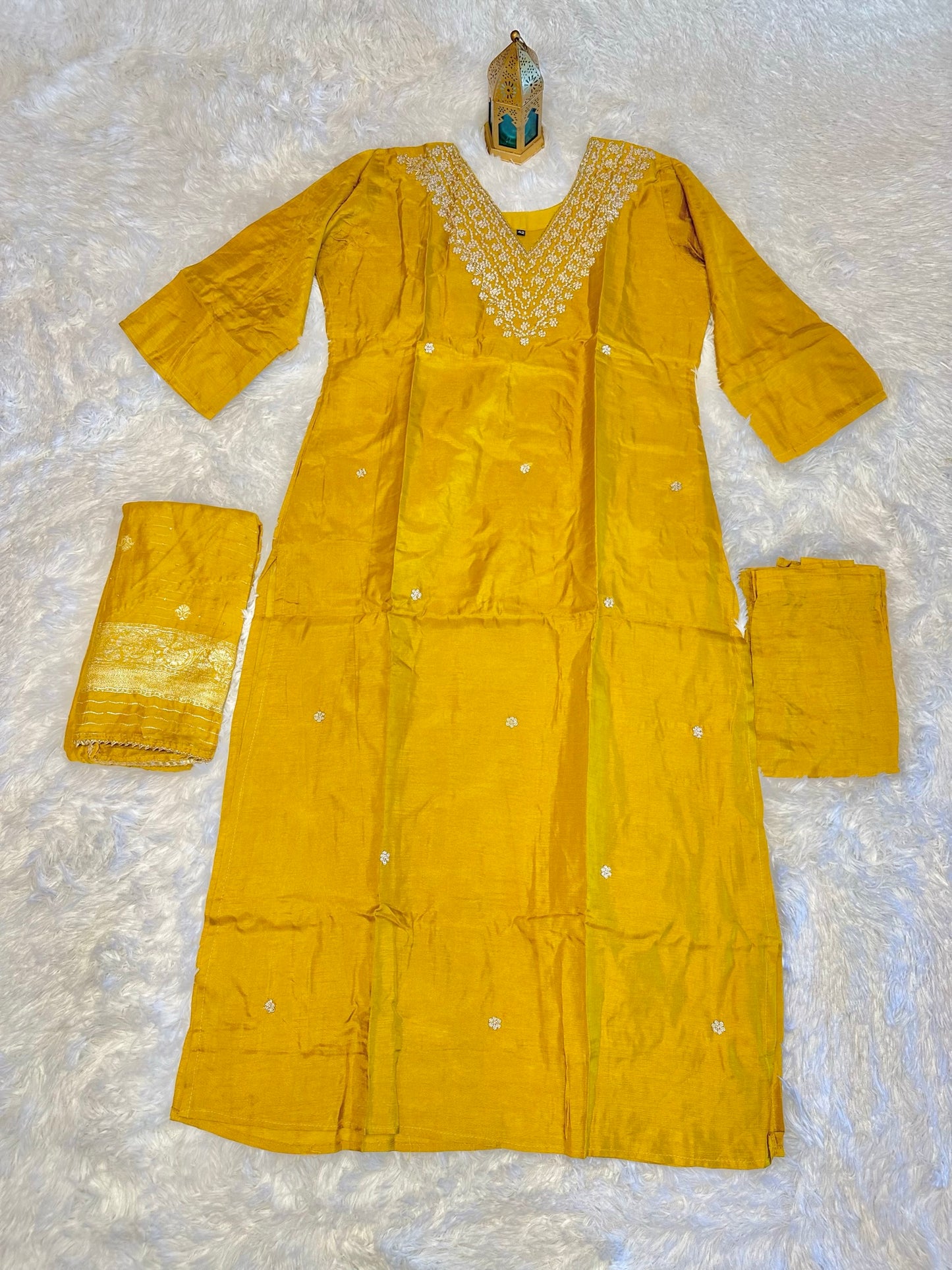 Pure dola silk suit with bottom and banaras style dupatta.