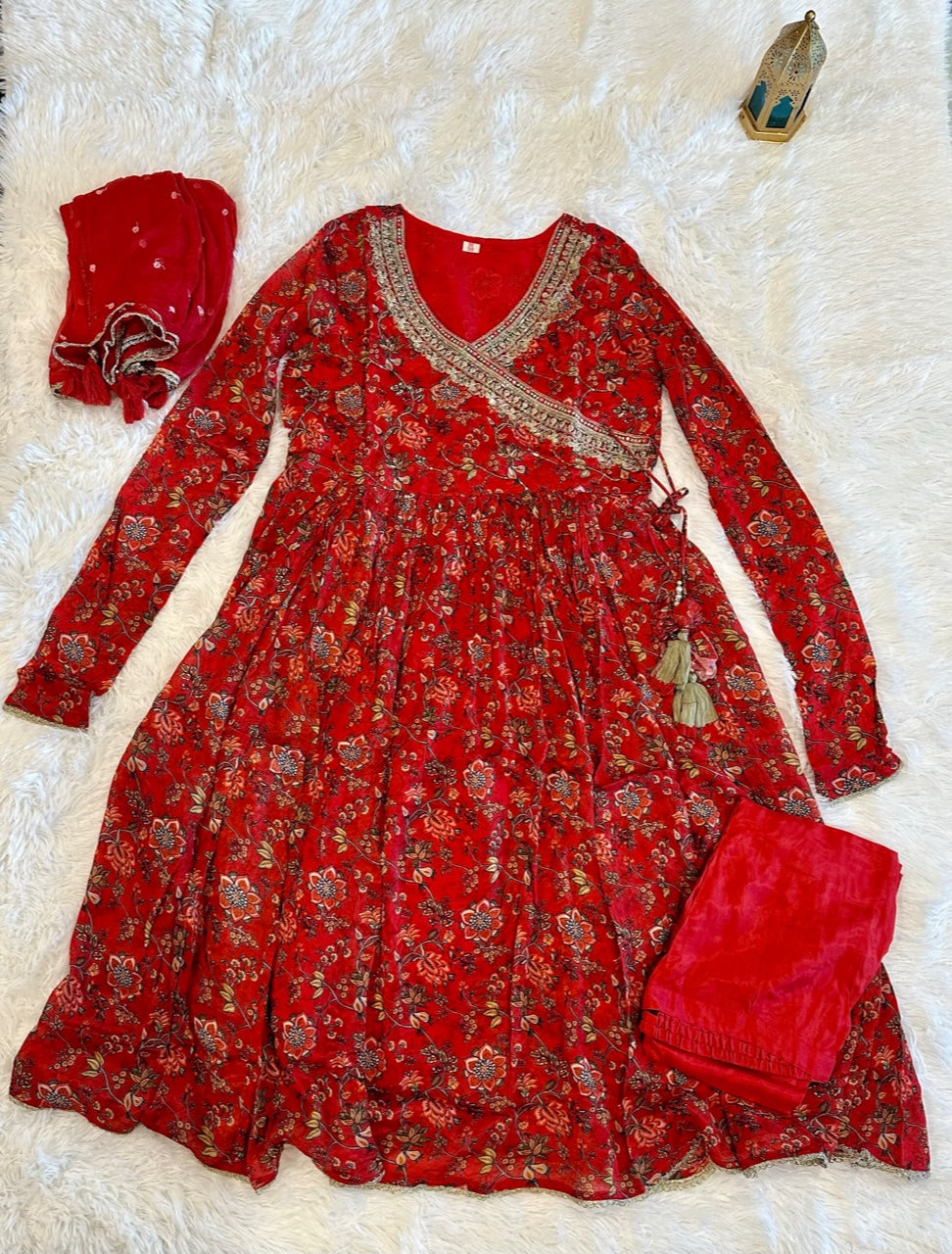 Beautiful red floral print anarkali suit with pant and dupatta.