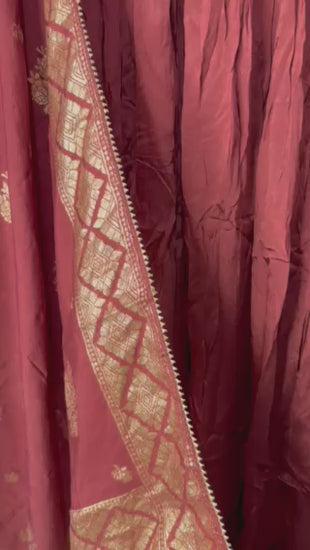 Shows close up view of the top with dupatta.